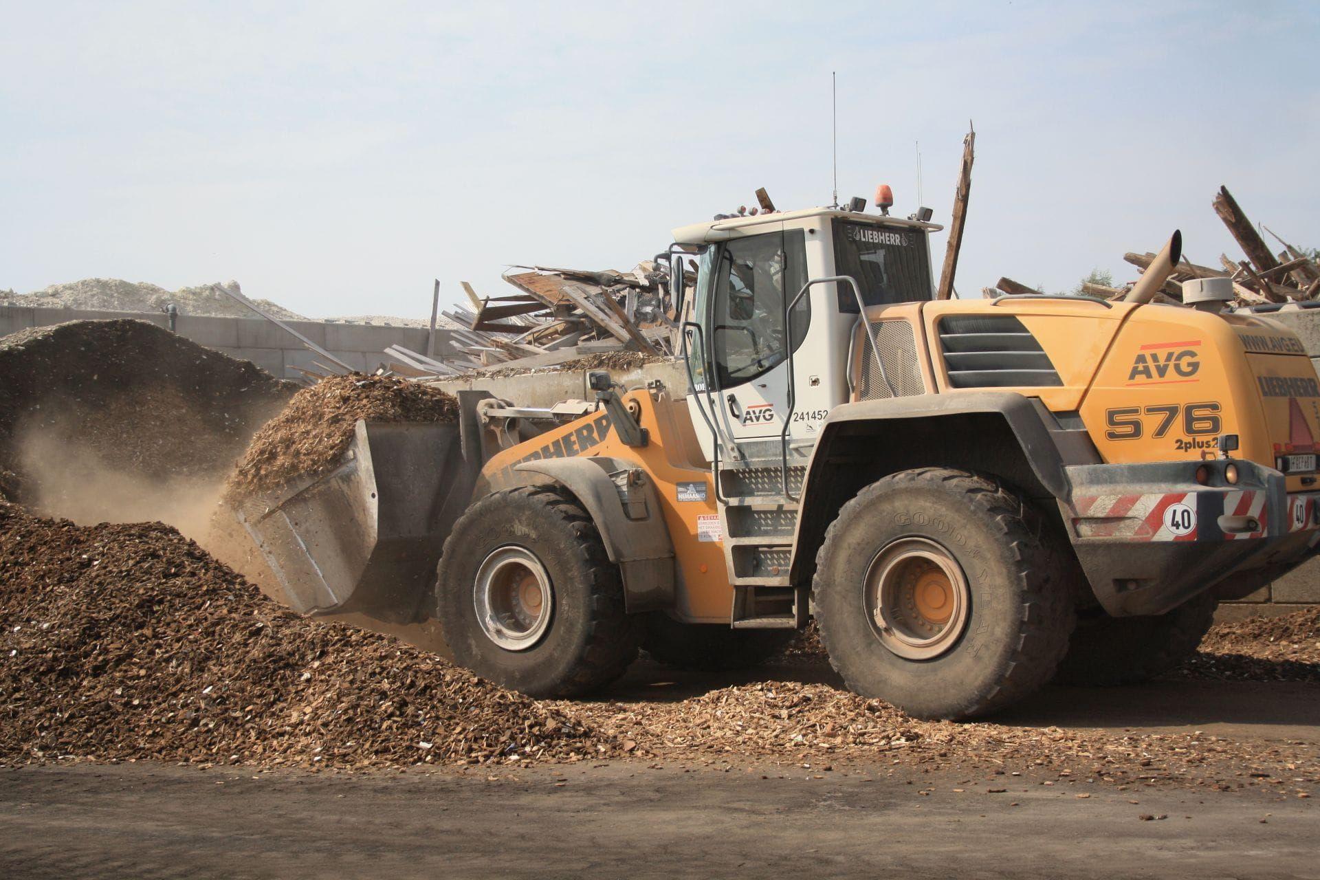 shovel-hout-recycling-avg-bouwstoffen-puin-afval-grond-recycling shovel-hout-recycling-avg-bouwstoffen-puin-afval-grond-recycling