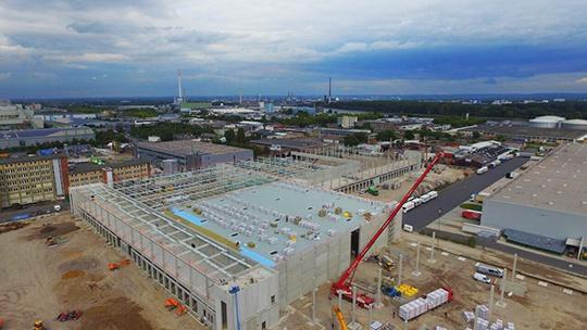 AVG Bau Goch kreeg opdracht voor volledige infrastructuur industrieterrein Keulen, Köln, inclusief grote logistieke hal en kantoren. Industriestraße Köln.